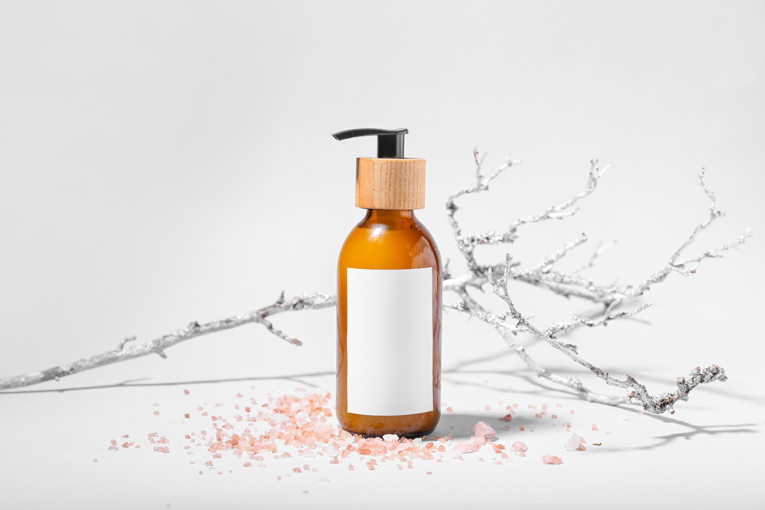 Bottle with Natural Shampoo on White Background