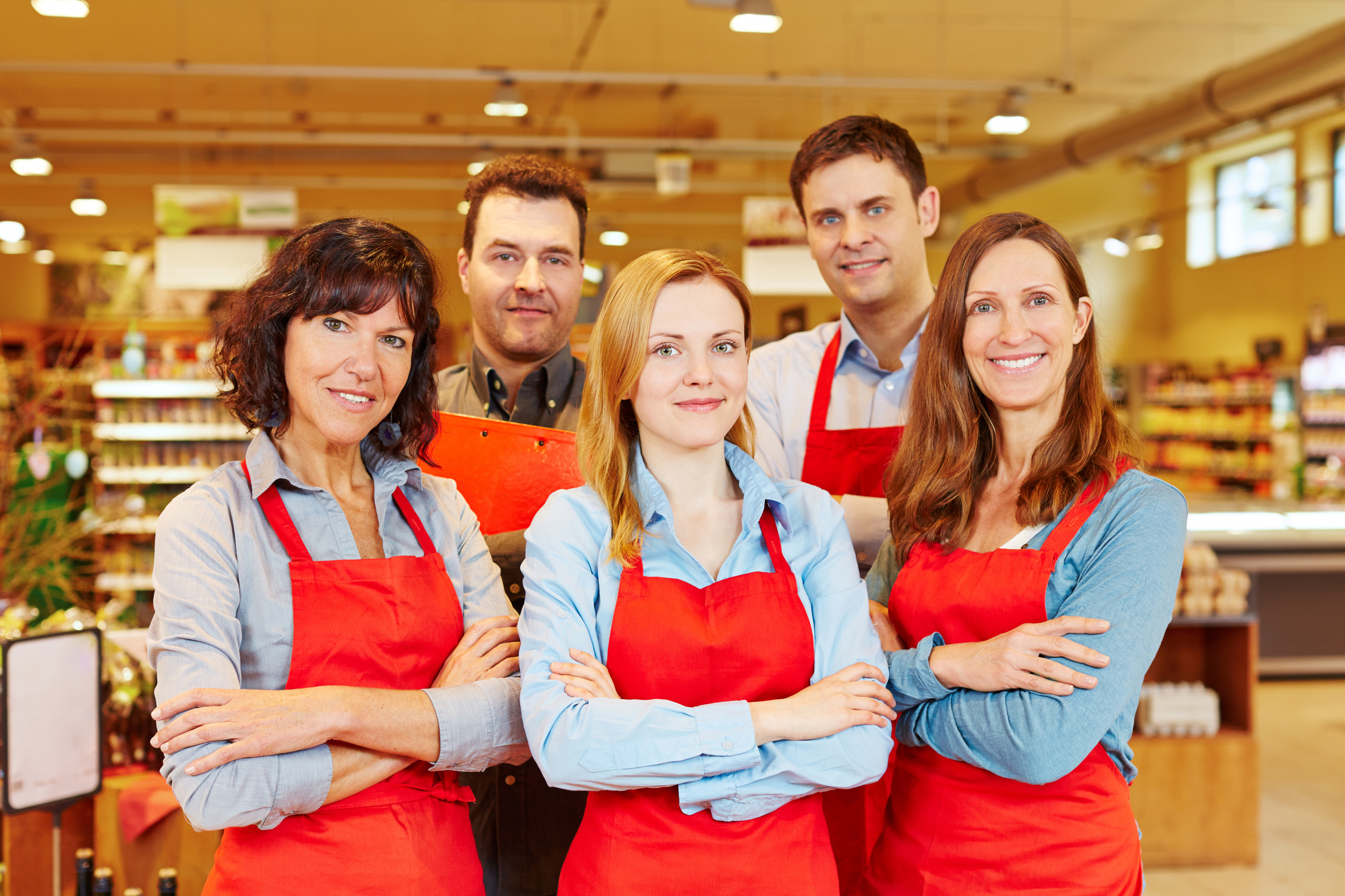 Team of Five Salespeople in Supermarket